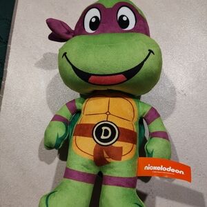 This 14" plush Donatello figure from the Teenage Mutant Ninja Turtles franchise